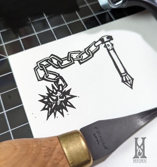 White paper with inky black print of a flail. The flexcut gouge used to carve the stamp that made this print rests in the lower frame of the photo.